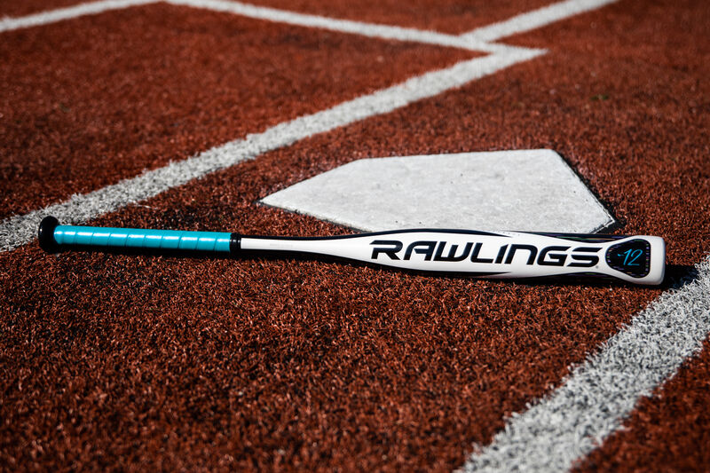 A Rawlings 2020 Eclipse bat lying next to home plate - SKU: FPZE12 loading=