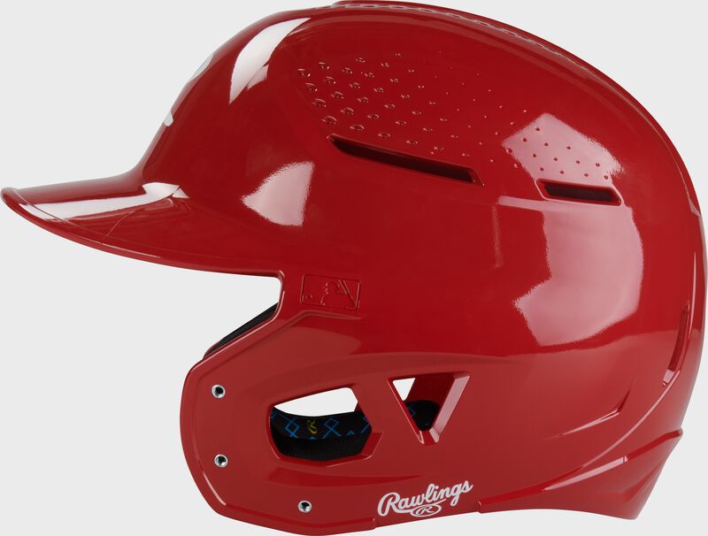 Left side of a scarlet Rawlings RX2 gloss baseball batting helmet