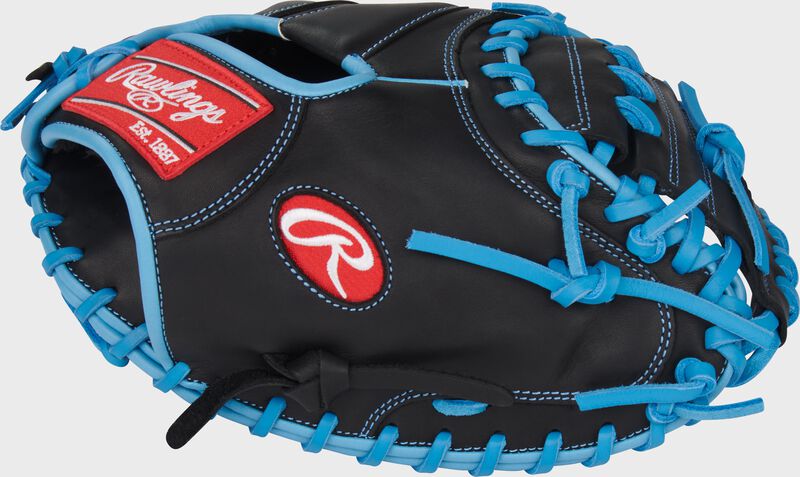 Black thumb of a R9 Series 32.5-Inch Catcher's Mitt with a red Rawlings Oval-R loading=