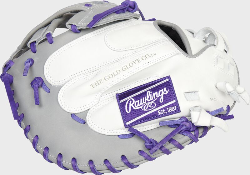 Back of a white/gray/purple 34-Inch Liberty Advanced Color Series catcher's mitt with a purple Rawlings patch - SKU: RLACM34FPWPG loading=