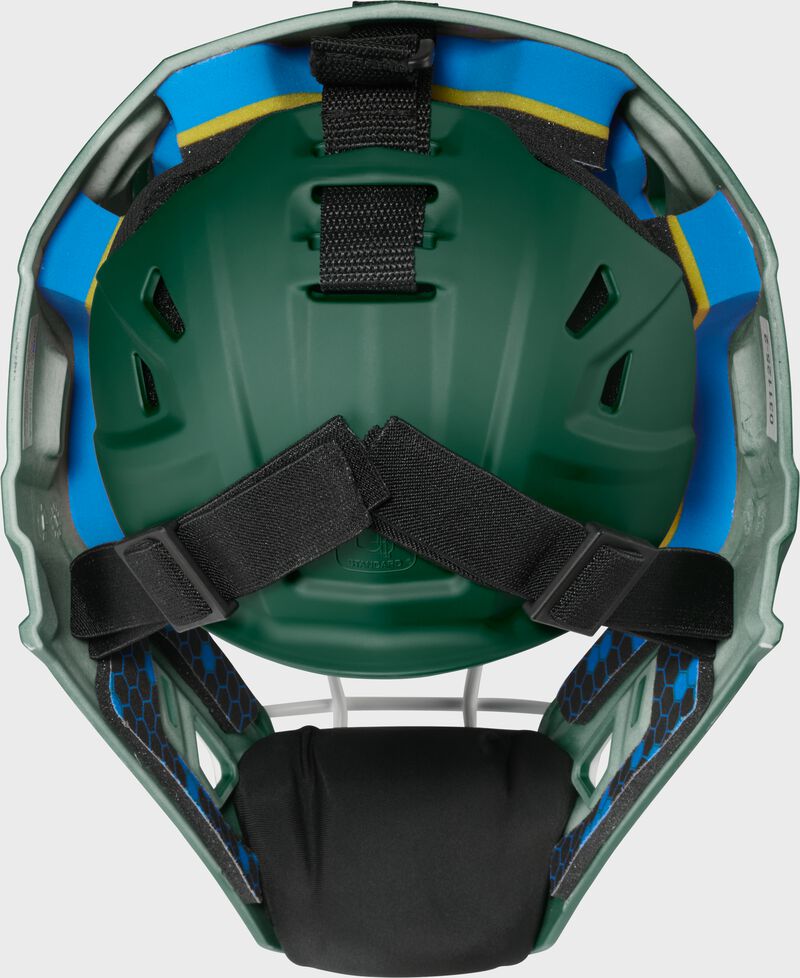 Back of a dark green Rawlings Mach Pro Series catcher's helmet