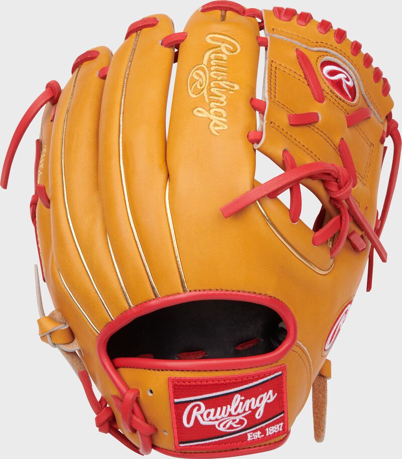 Back of a tan Heart of the Hide Jeremy Pena infield glove with a red Rawlings patch