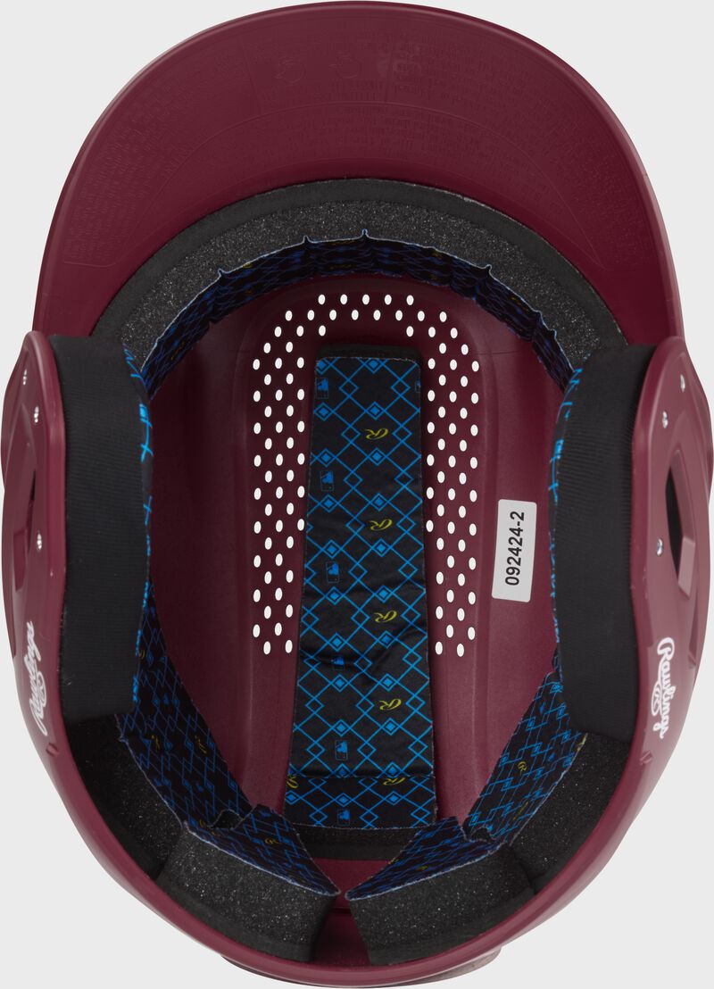 Inside padding of a maroon Rawlings RX2 batting helmet
