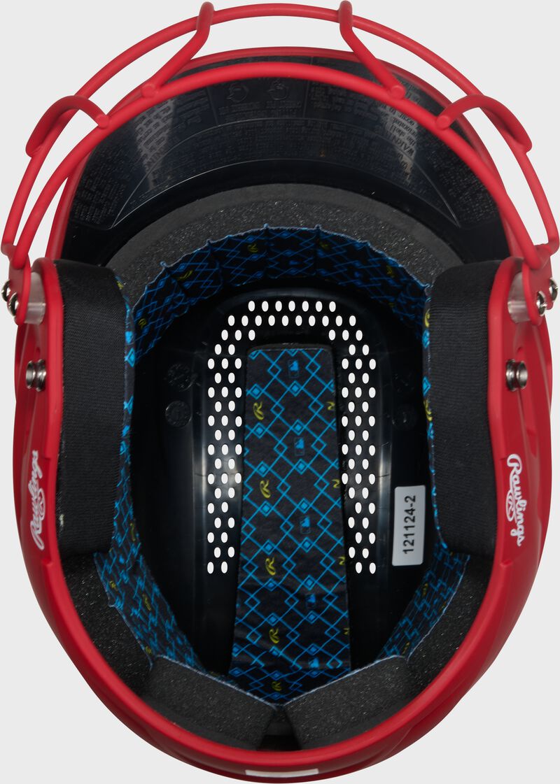 Inside padding of a scarlet Rawlings RX2 fastpitch batting helmet