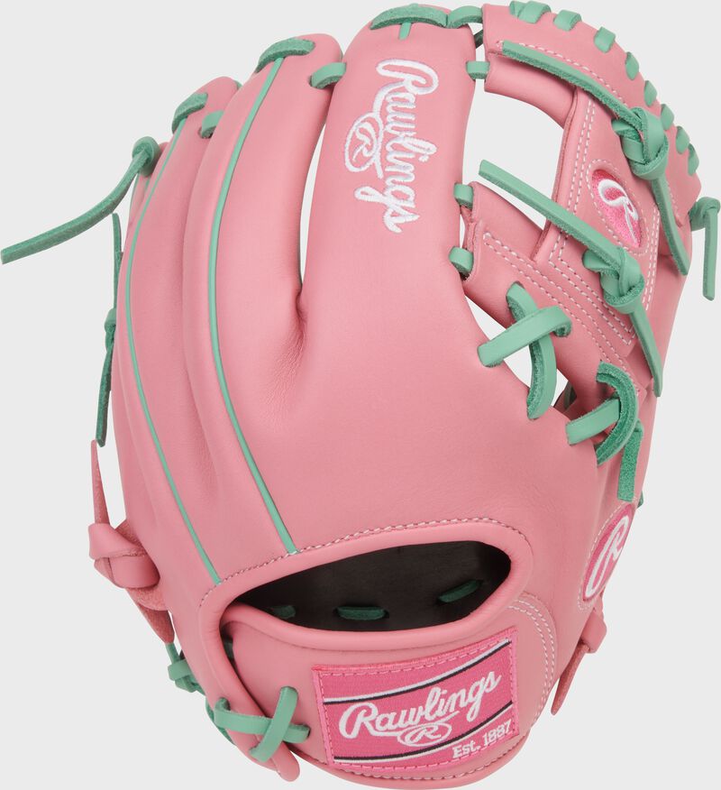 Pink back of a Rawlings NXT Series 11.5-Inch Pink Infield Glove with a pink Rawlings patch