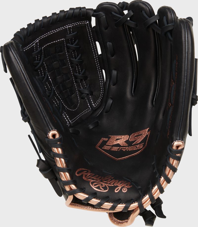 Black palm of a Rawlings R9 Series fastpitch glove with rose gold stamping and black laces loading=