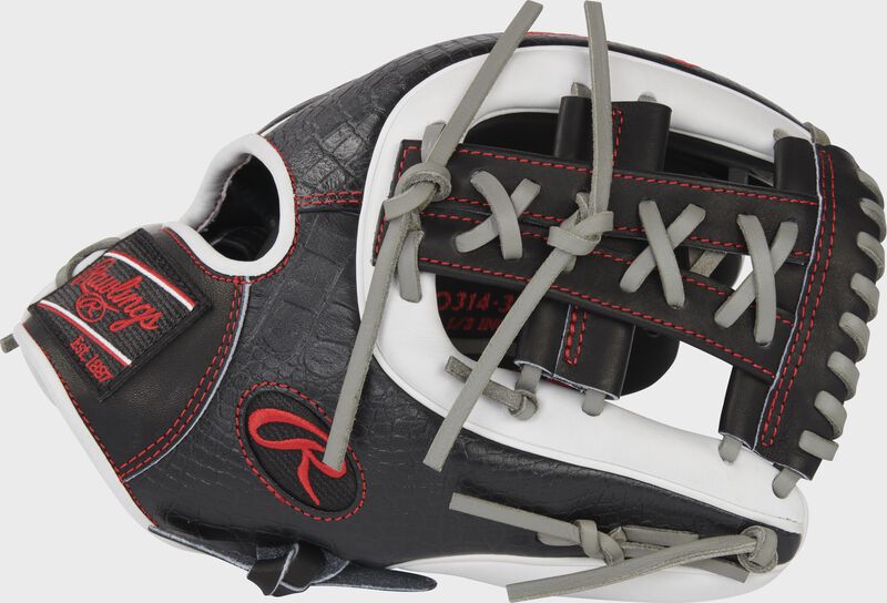 Thumb of a black/white Heart of the Hide 11.5" infield glove with a black split single post web - SKU: PRO314-32BW