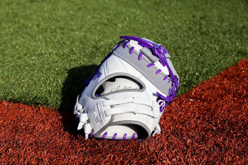 Back of a Liberty Advanced Color Series 13-inch first base mitt on a field - SKU: RLADCTSBWPG loading=