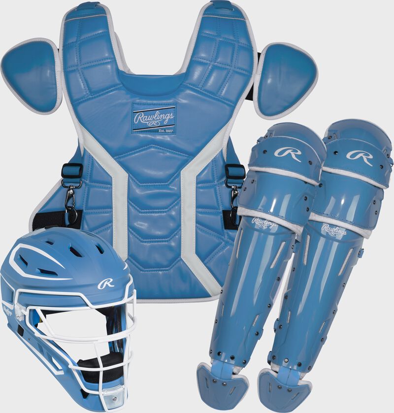 A Columbia blue Mach Pro Series Catcher's set with a helmet, chest protector, and leg guards loading=