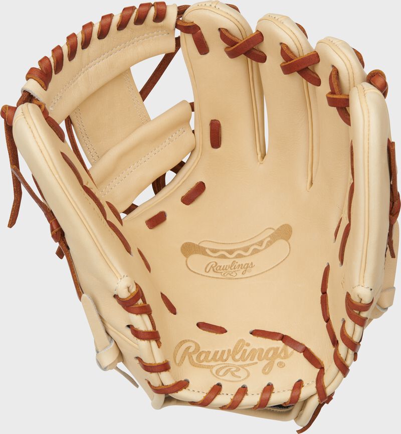 Camel palm of a Rawlings Heart of the Hide Hot Dog glove with a hot dog palm stamp loading=