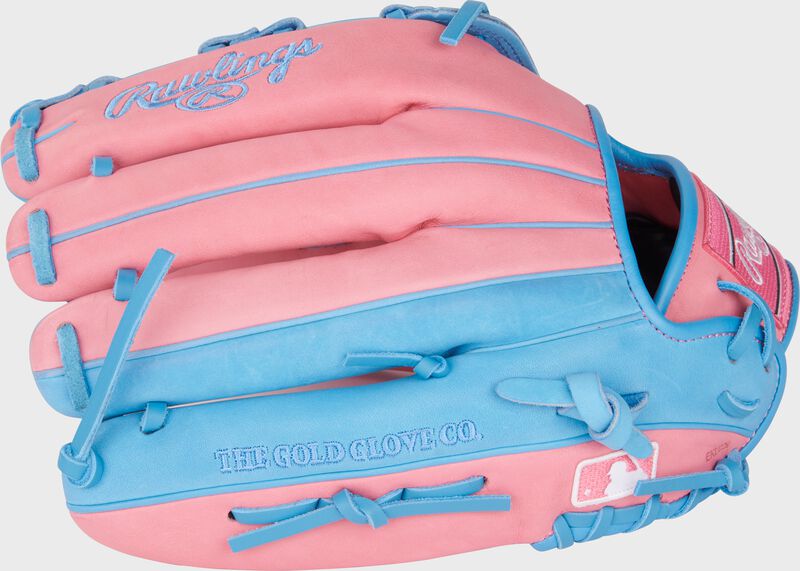 Pink/Columbia blue back of a Heart of the Hide ContoUR Fit outfield glove with the MLB logo on the pinky