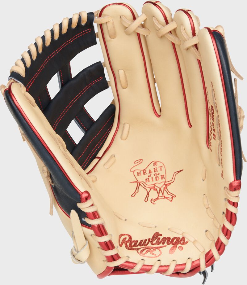 Camel palm of a Rawlings 12.75" Heart of the Hide outfield fastpitch glove with scarlet stamping loading=