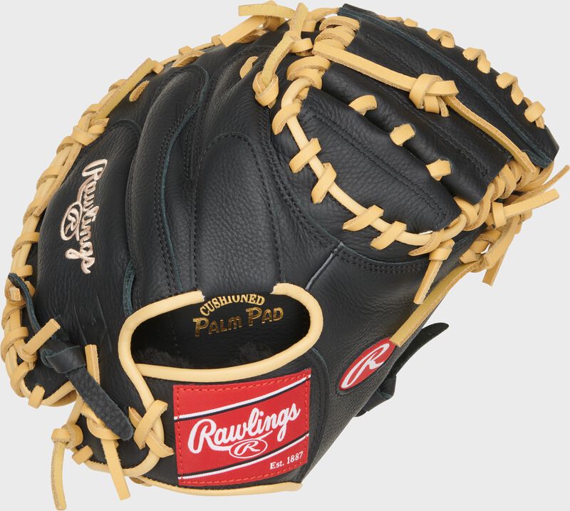 Back of a black Adley Rutshman Select Pro Lite 32" Catcher's Mitt with a red Rawlings patch
