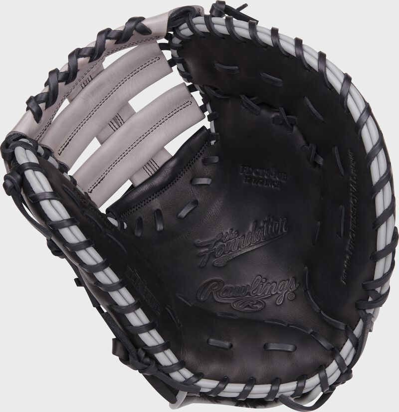 Black palm of a Rawlings Foundation Series youth first base mitt with black laces - SKU: RSGRFDCT8-10B loading=
