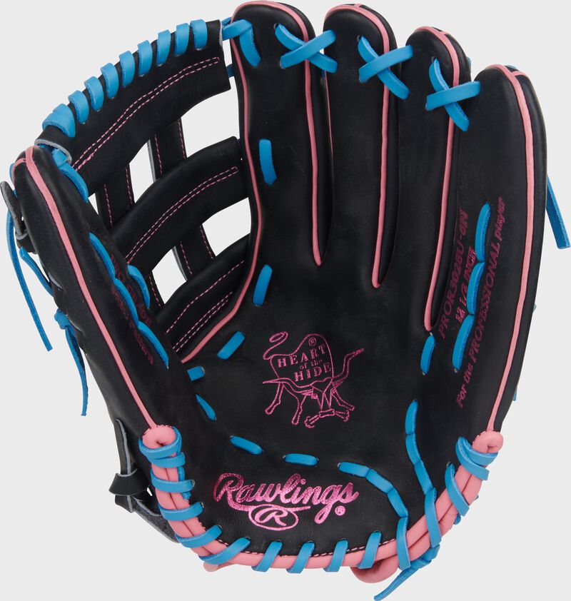 Black palm of a Heart of the Hide ContoUR Fit 12.5-Inch Baseball Glove with pink stamping and Columbia blue laces