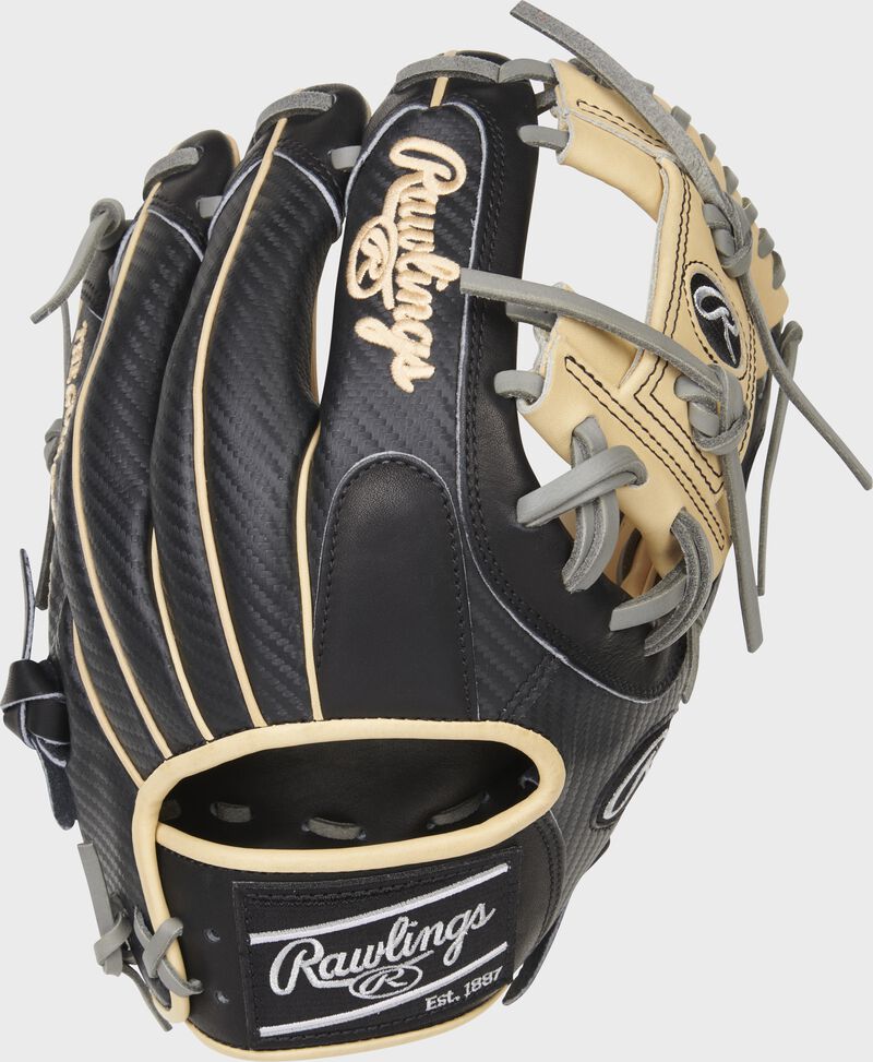 Black Hyper Shell back of a Heart of the Hide Hyper Shell 11.5" I-web glove with a black Rawlings patch - SKU: PRO204-2CBCF loading=