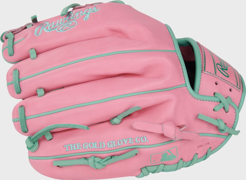 Back of a Heart of the Hide Vibrant Series pink 11.5" infield glove with the MLB logo on the pinky