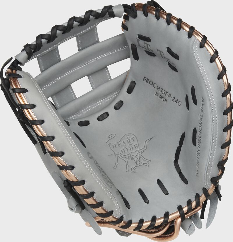 Palm of a gray Rawlings Heart of the Hide softball catcher's mitt with black laces - SKU: PROCM33FP-24G loading=