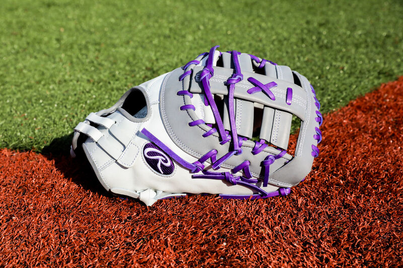 A white/gray/purple Liberty Advanced 1st Base mitt on a field - SKU: RLADCTSBWPG loading=