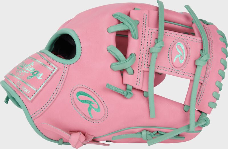 Thumb of a Heart of the Hide Vibrant Series pink 11.5" infield glove with a pink I-web