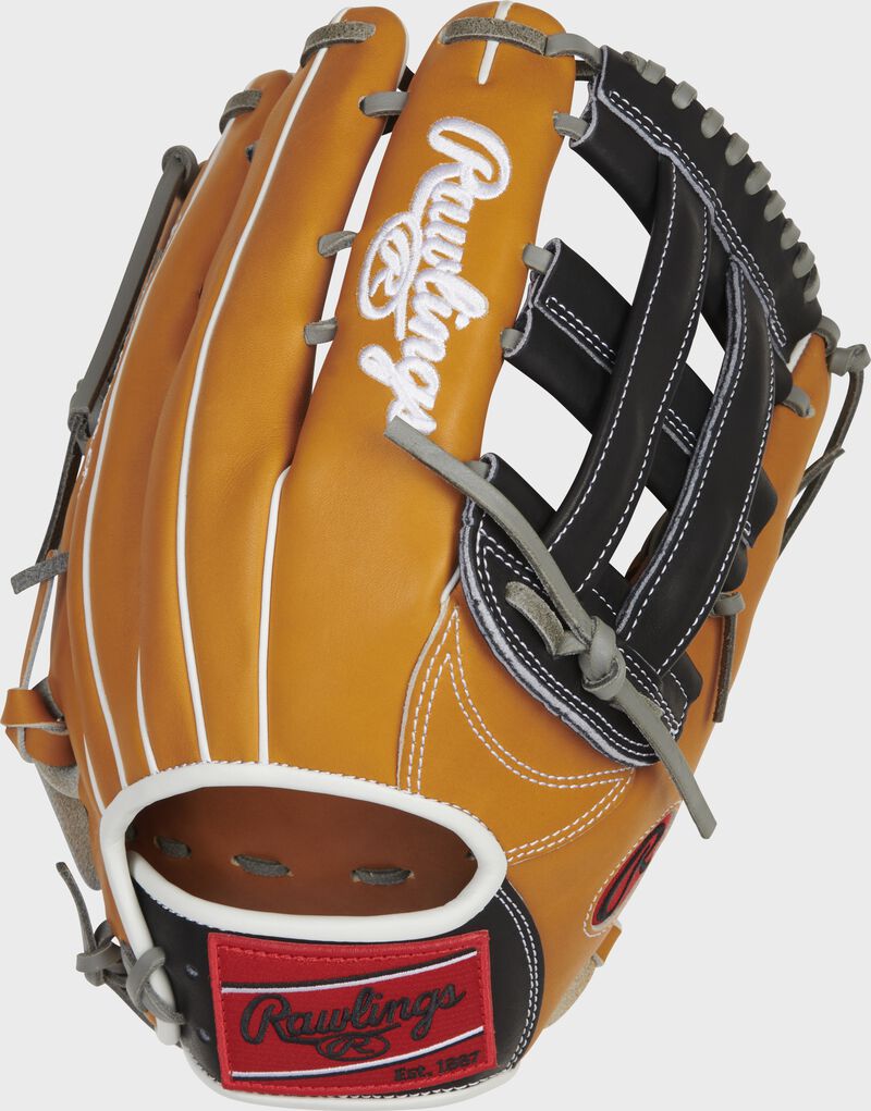 Tan back of a Heart of the Hide 12.75" H-web glove with a red Rawlings patch - SKU: PRO3039-6TB
