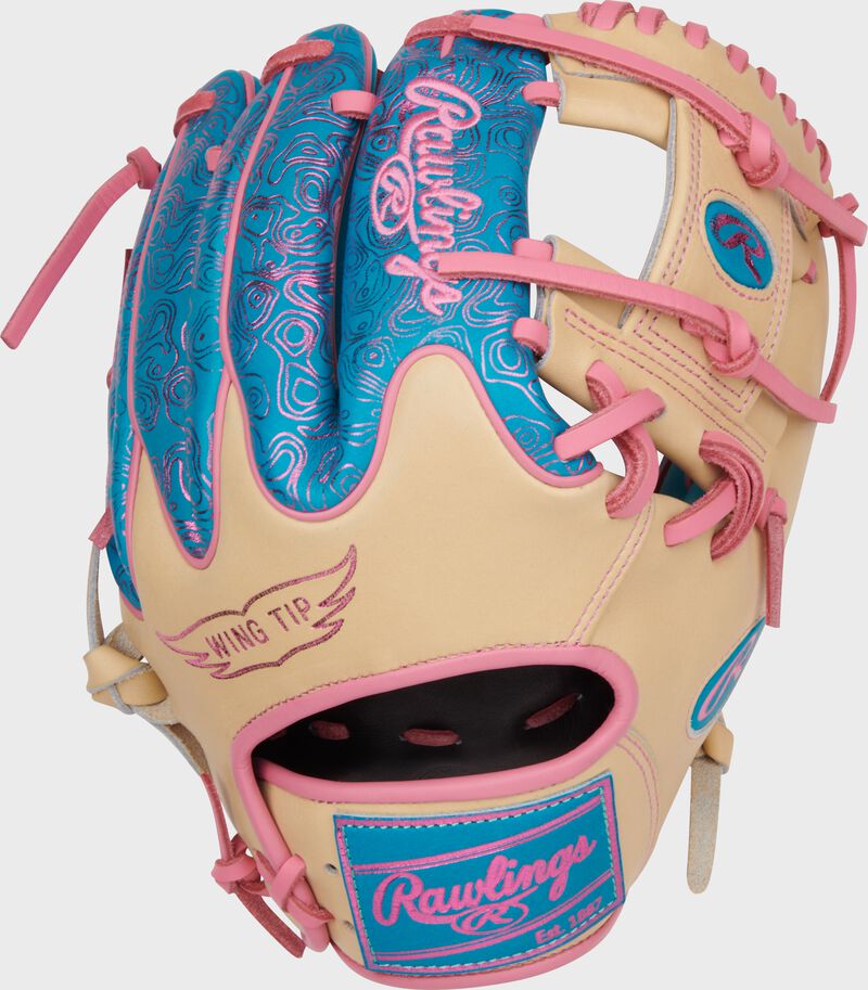 Wing tip back of a teal/camel Heart of the Hide Vibrant Series teal topo print infield glove
