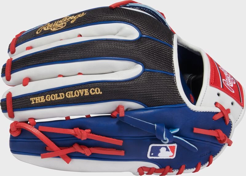 Back of a Gameday 57 Series Adolis García Heart of the Hide Glove with the MLB logo on the pinky
