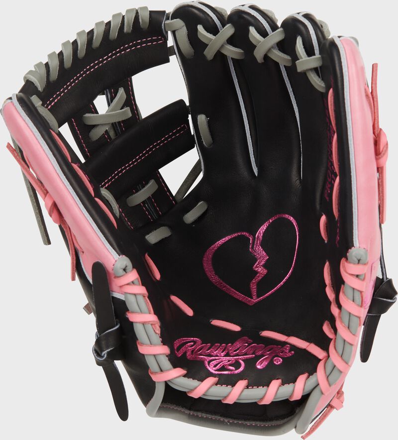 Black palm of a Rawlings Heart of the Hide Broken Heart 11.5" glove with a pink broken heart stamped in the palm