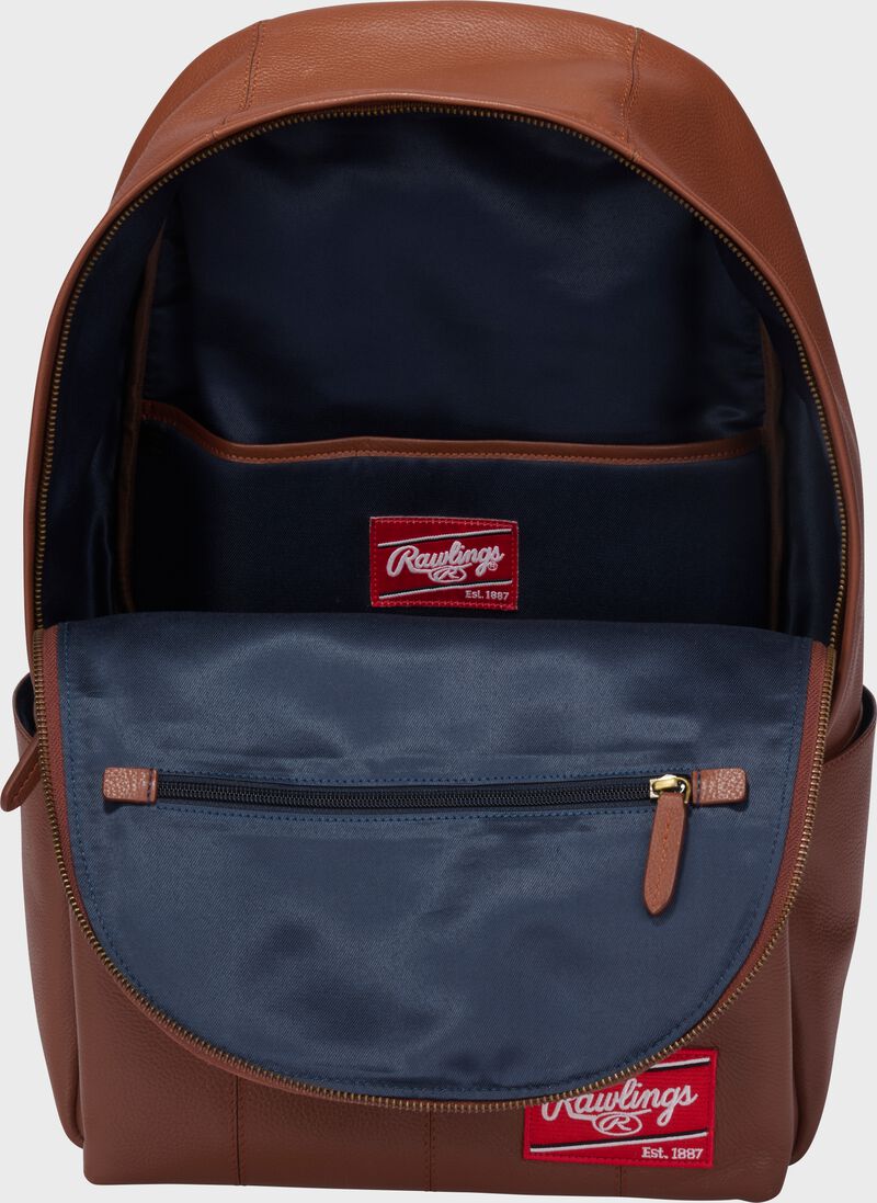 Inside view of a tan Rawlings Strike Out backpack loading=