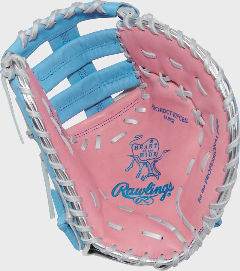 Pink palm of a Rawlings Heart of the Hide R2G 13" 1st base mitt with white laces