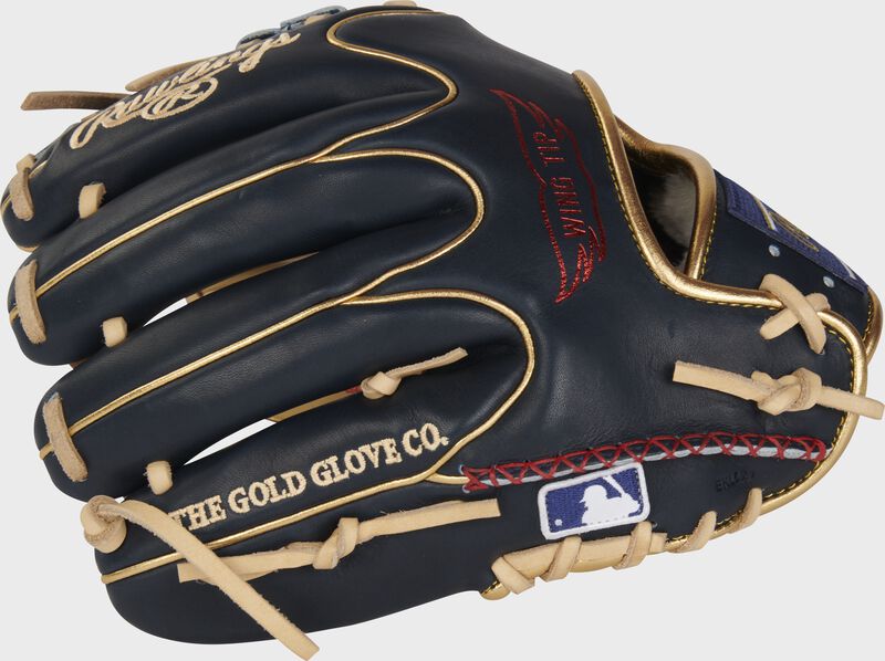 Back of a navy Pro Preferred Wing Tip infield glove with hand-sewn welting and the MLB logo on the pinky - SKU: PROS204W-2CN
