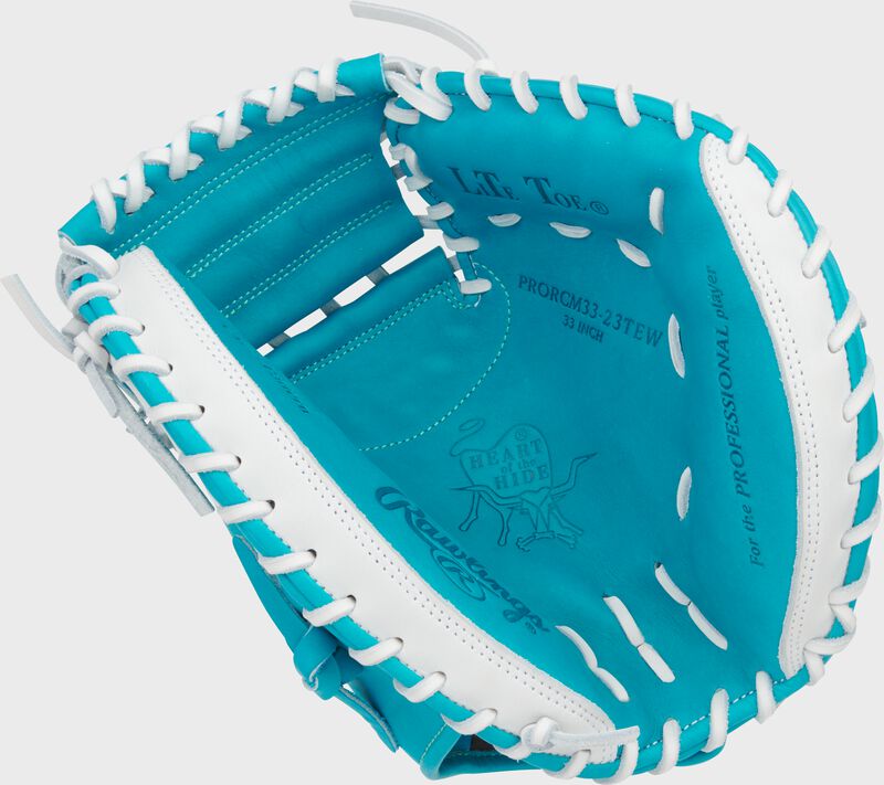 Teal palm of an Exclusive Heart of the Hide 33-Inch Catcher's Mitt with white laces