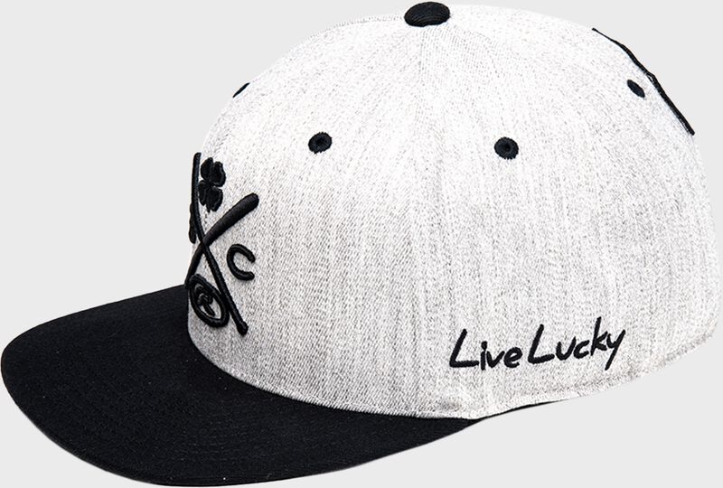 A white/black Rawlings Black Clover "Baseball is Life" snapback hat with "Live Lucky" on the side - SKU: BCR1BIS loading=