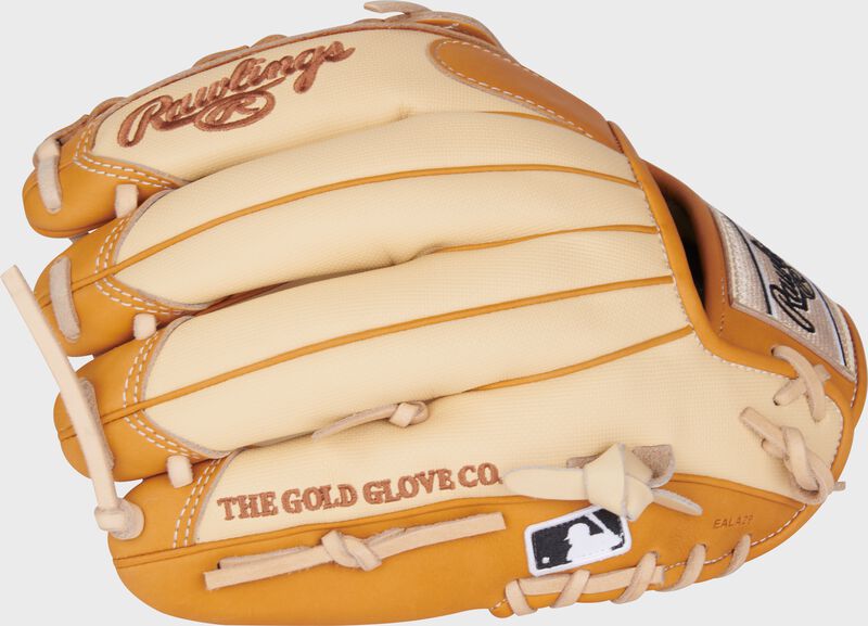 Camel Speed Shell back of a Heart of the Hide 11.75" infield glove with the MLB logo on the pinky