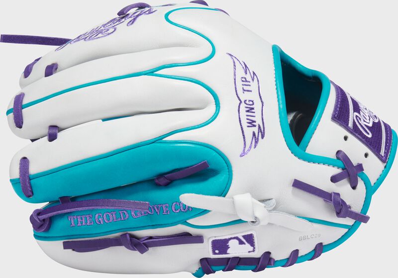 Wing Tip back of a white/teal Exclusive Heart of the Hide R2G Wing Tip 11.5-inch Infield Glove with the MLB Logo on the pinky