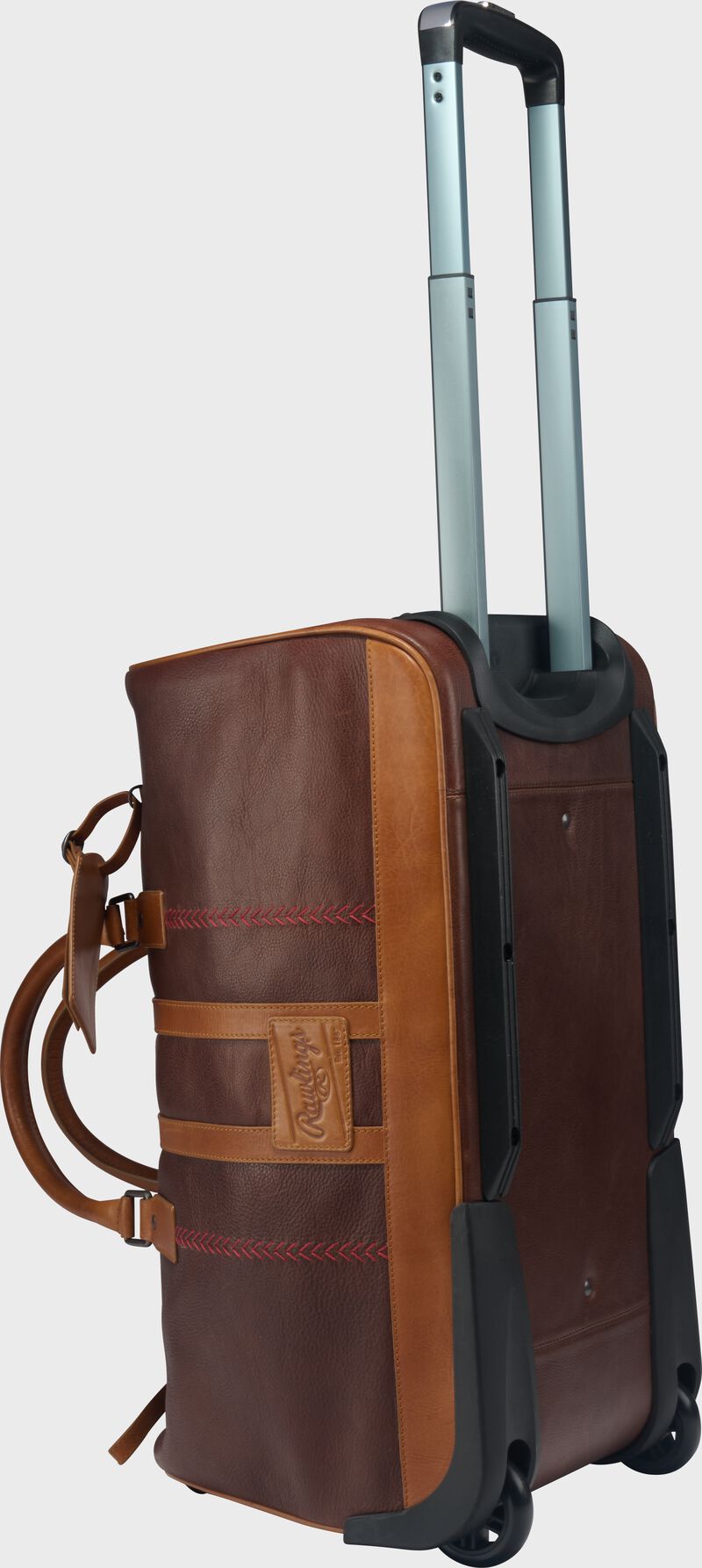 Side view of a Rawlings Heritage Wheeled Duffle Trolley Bag standing up with the handle pulled out loading=
