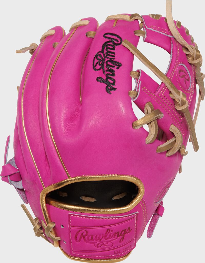 Back of a berry Heart of the Hide berry 11.5" infield glove with a berry leather Rawlings patch on the wrist