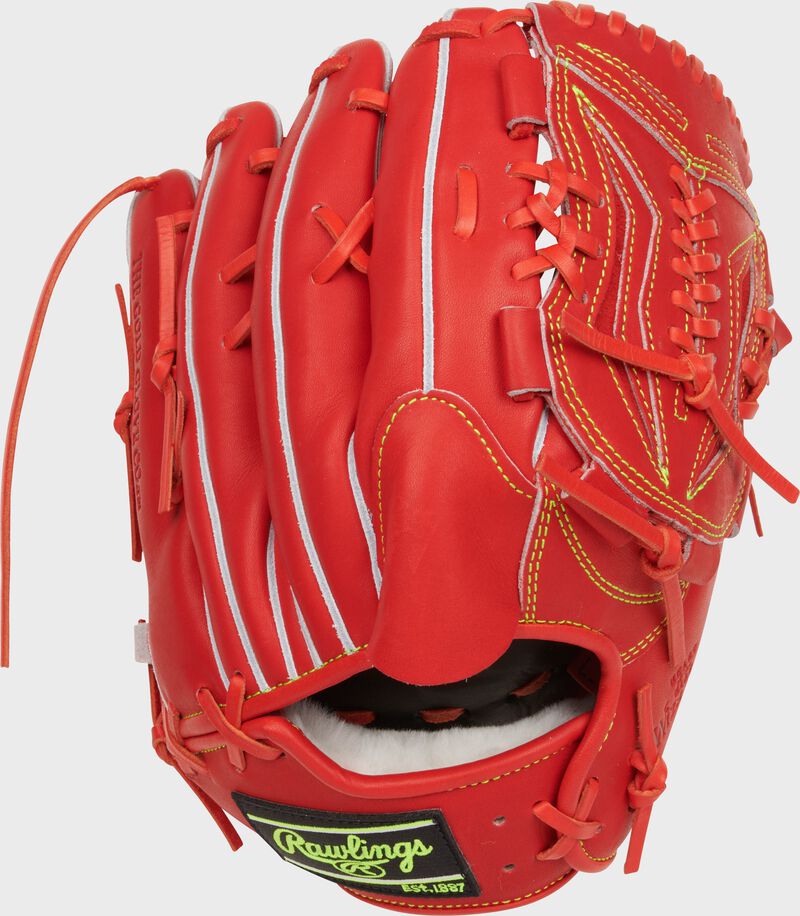 Back of a red orange Rawlings Heart of the Hide Japan Series 11.75" glove