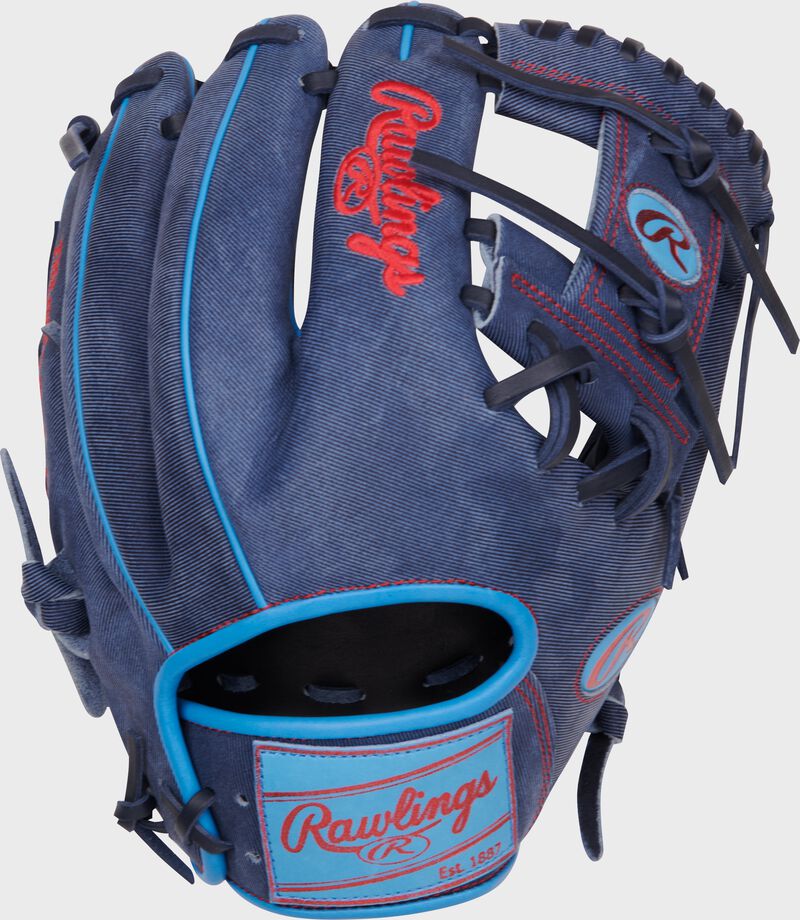 Denim back of a Heart of the Hide Pro Label denim infield glove with a Columbia blue leather patch loading=