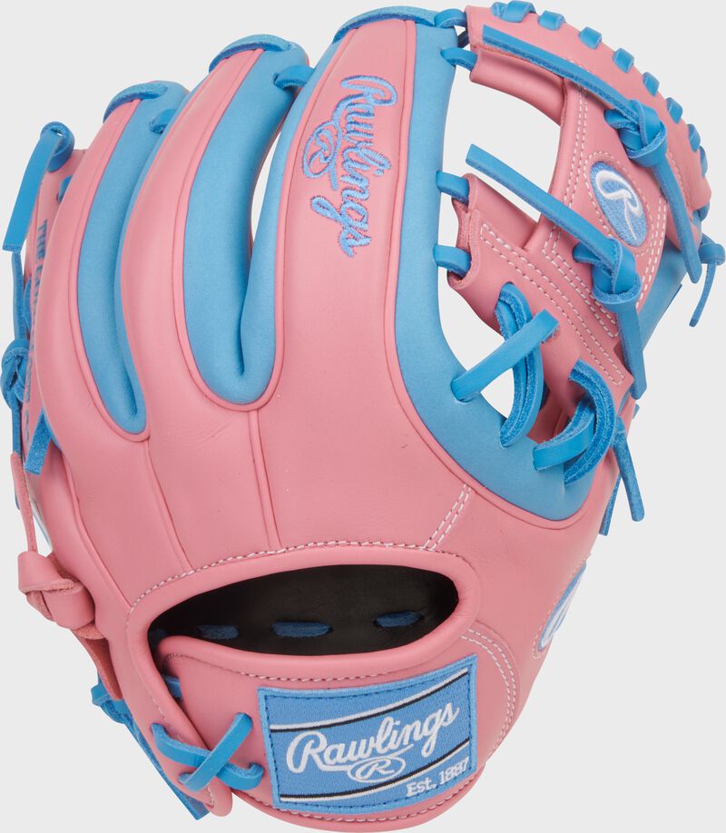 Back of a pink/Columbia blue Rawlings NXT Series 11.5-Inch Infield Glove with a Columbia blue Rawlings patch