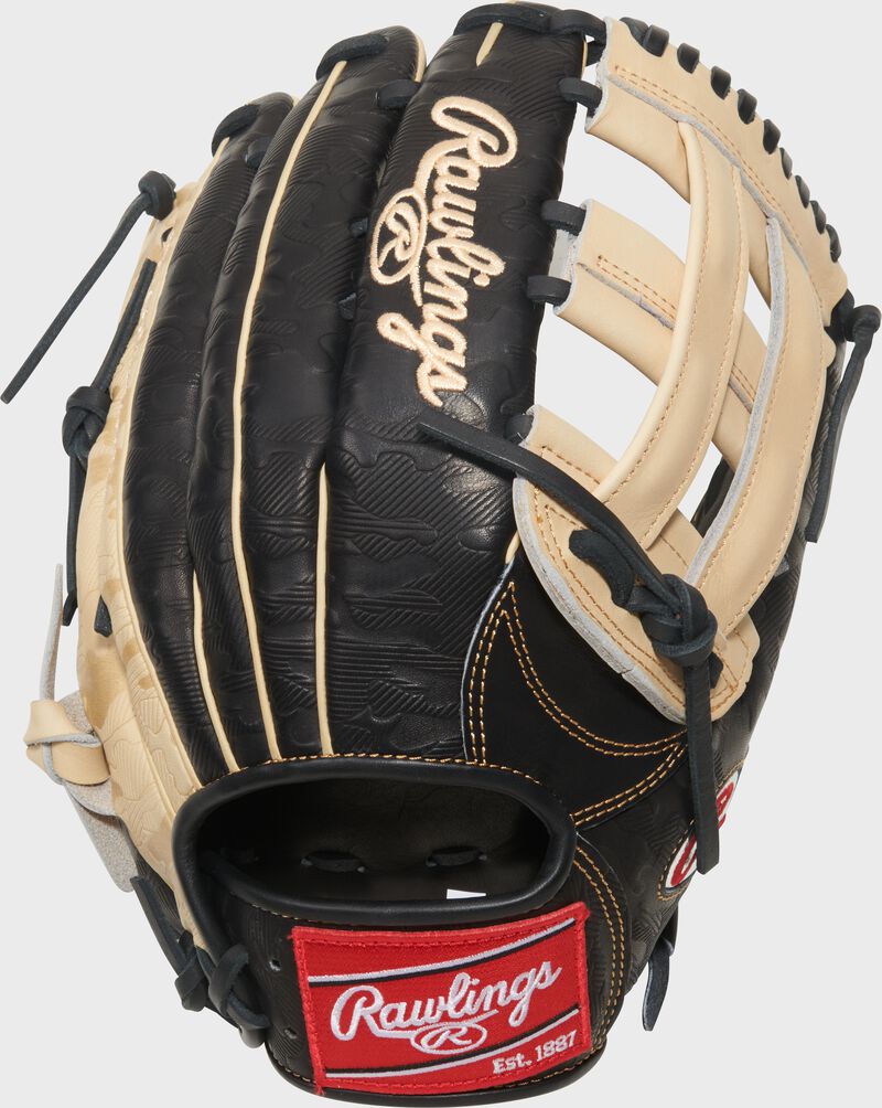 Black back of a Gameday 57 Series Fernando Tatís Jr. Heart of the Hide Glove with a red Rawlings patch