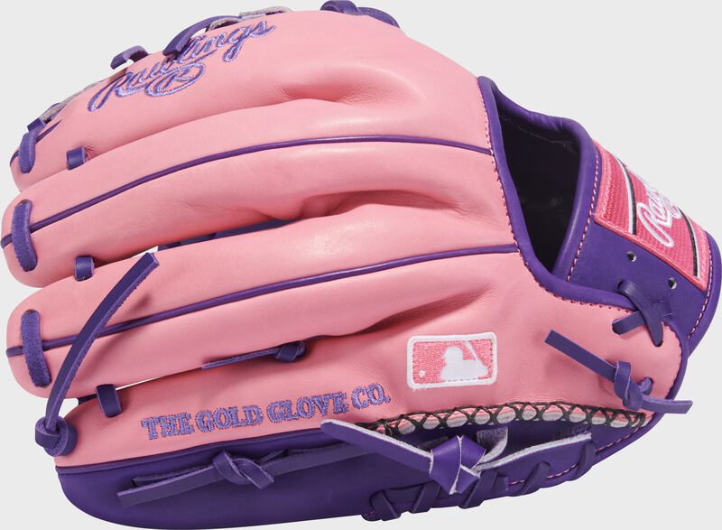 Back of an Exclusive Heart of the Hide R2G Purple/Pink 11.5-inch Infield Glove with the MLB logo on the pinky