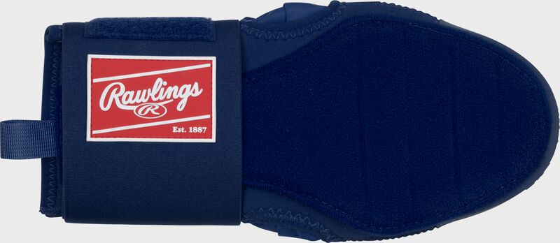 Palm of a navy Rawlings sliding mitt with a red Rawlings patch logo on the wrist cuff loading=