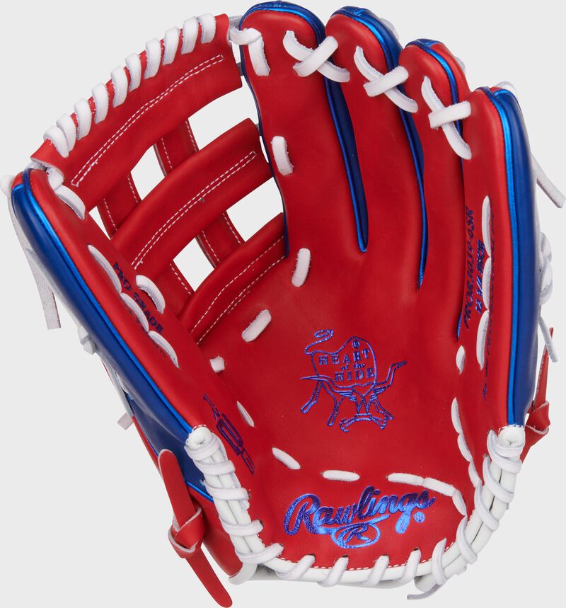 Scarlet palm of a Rawlings Luis Robert Jr. Heart of the Hide Outfield Glove with royal stamping and white laces