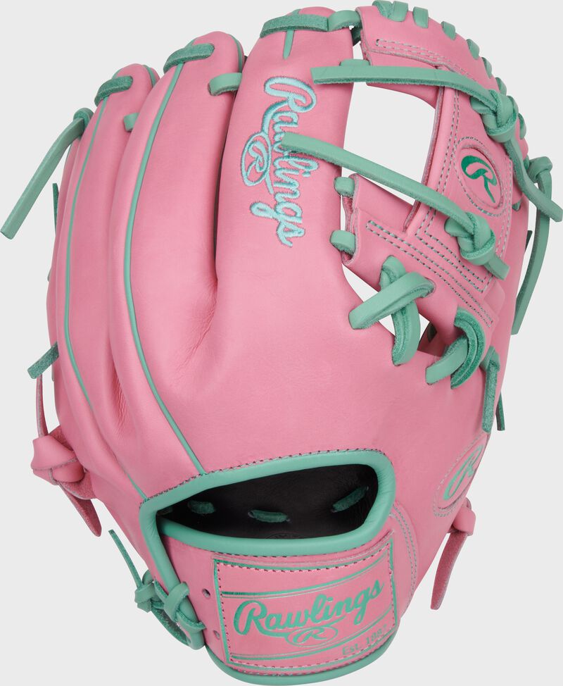 Back of a Heart of the Hide Vibrant Series pink 11.5" infield glove with a pink Rawlings patch
