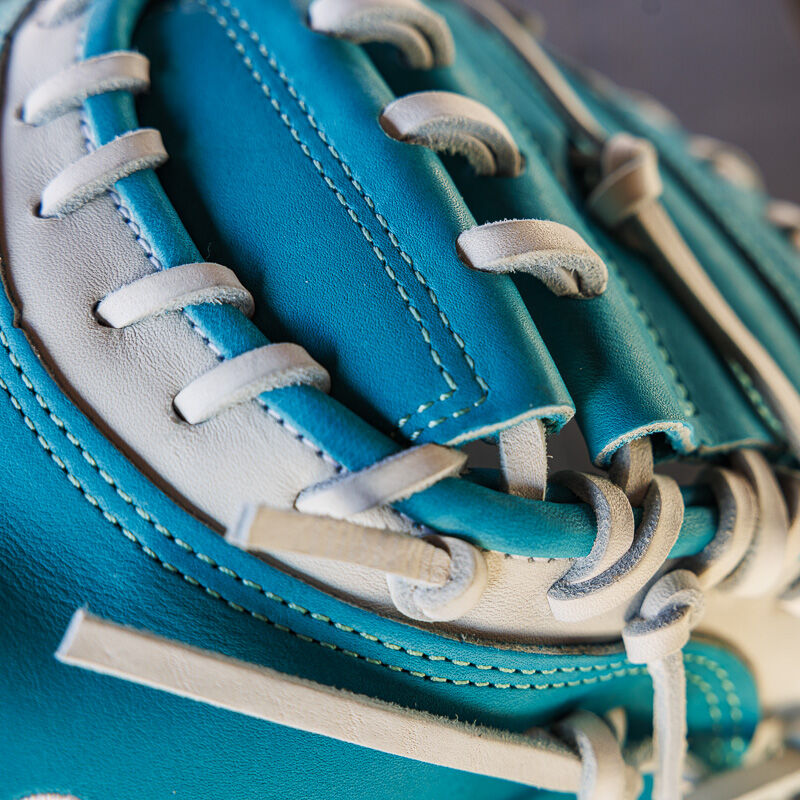 Picture of the teal web of an exclusive 33" Rawlings R2G Heart of the Hide catcher's mitt