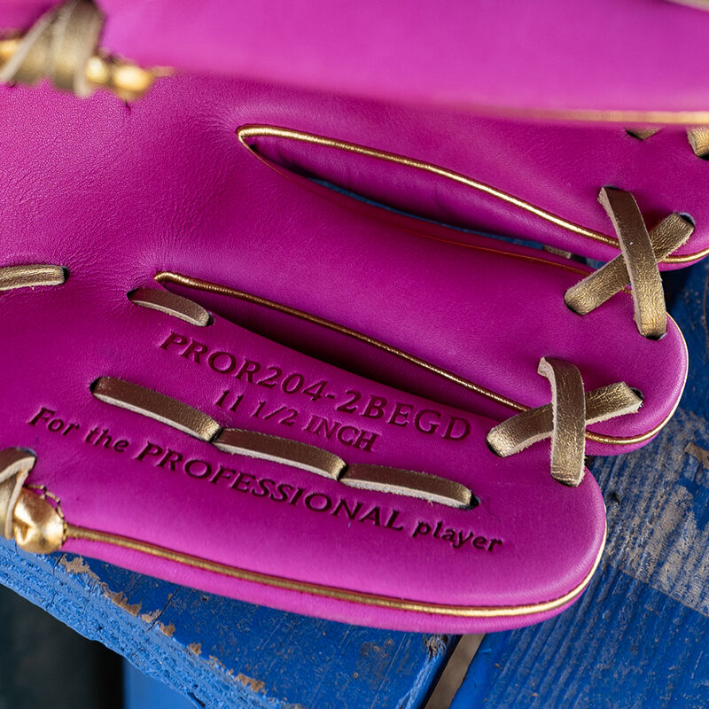 Picture of the pinky stamp of an Exclusive 11.5" R2G Heart of the Hide Berry infield glove