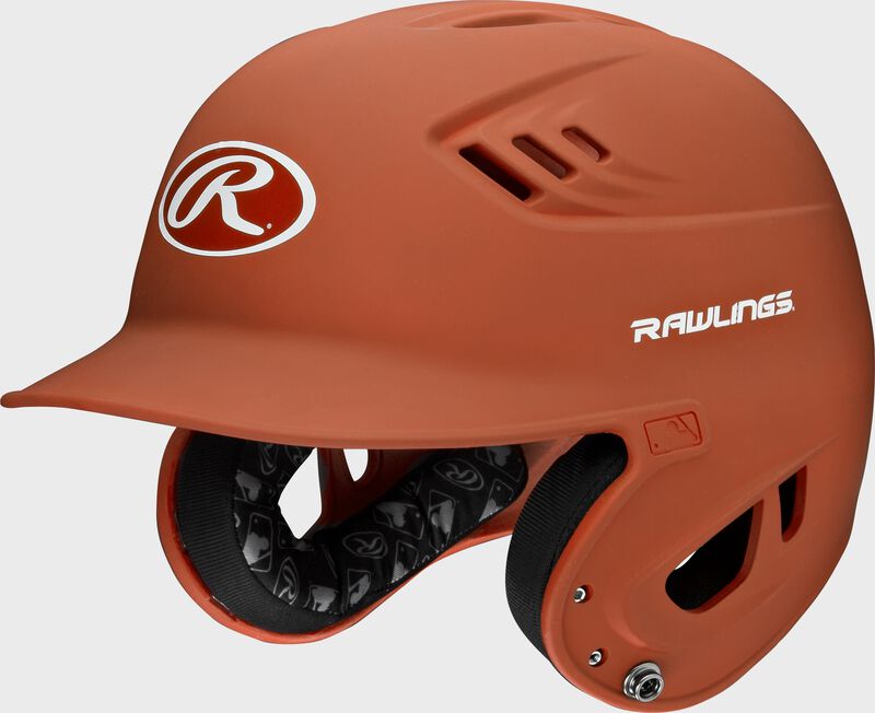 A burnt orange R16M Velo batting helmet with Cool-Flo vents loading=