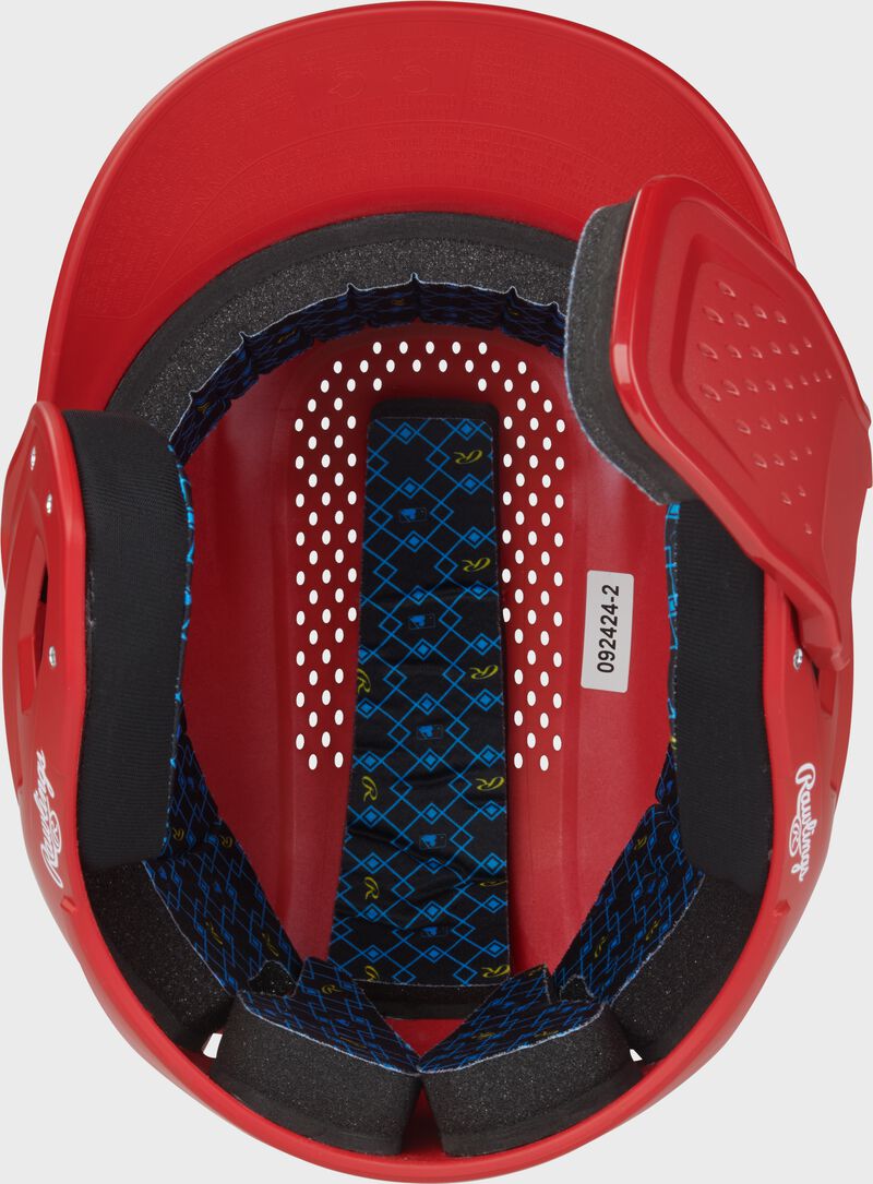 Inside padding of a scarlet Rawlings RX2 Reverse batting helmet