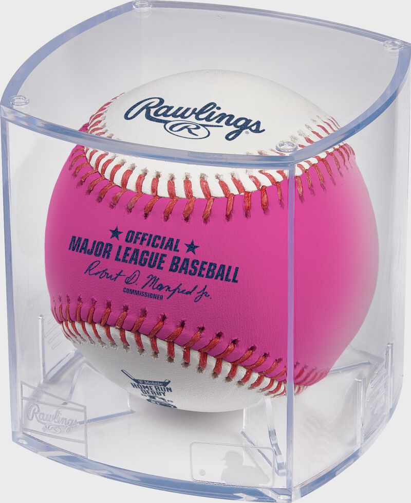 A white/pink 2025 MLB Home Run Derby Money Baseball in a clear display cube
